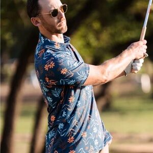 Raised by Coyotes brand Men's Dark Teal/Orange “Skulls and Daisies” Golf shirt